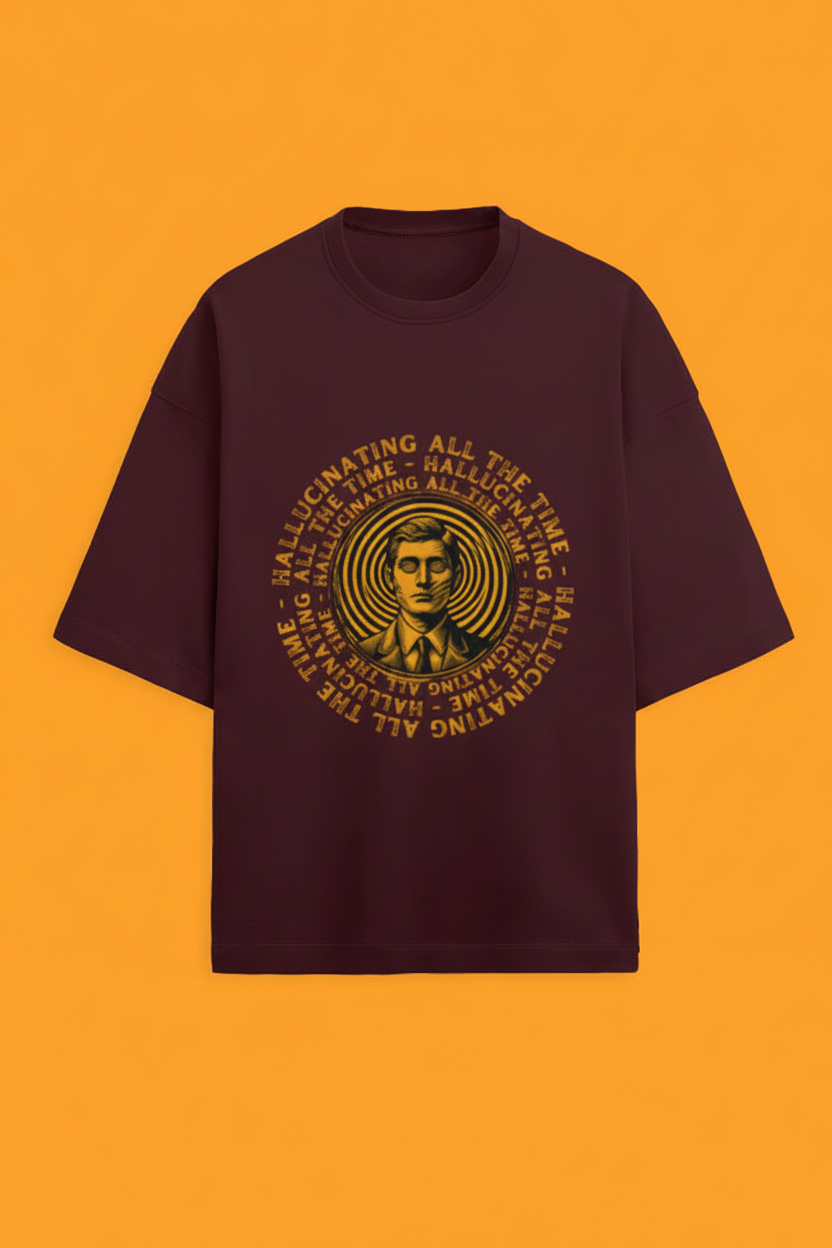 Maroon t-shirt with yellow graphic design on an orange background